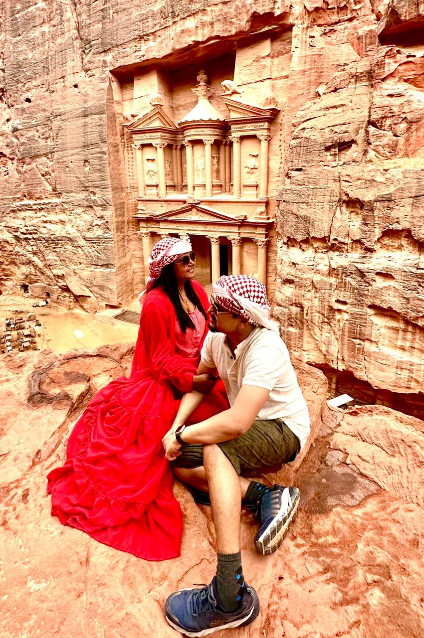 Sitting above the Treasury at Petra in red keffiyehs